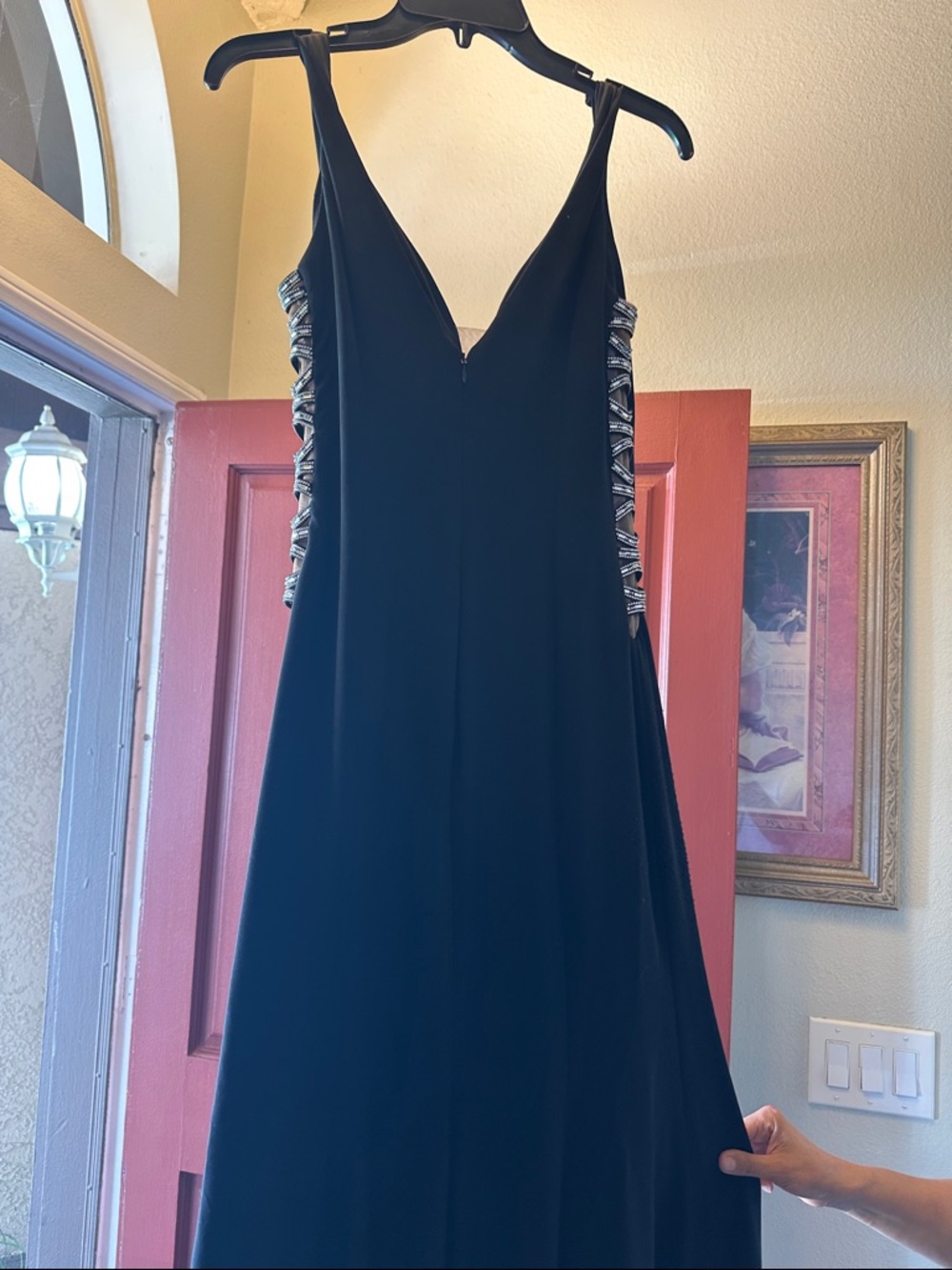 Xscape Black V-Neck Prom Dress with Silver Side Embellishments